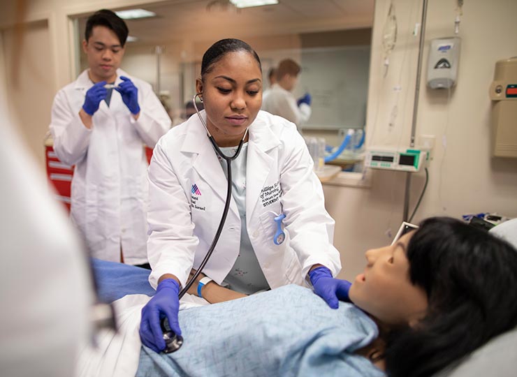 A nurse provides care to a patient in a hospital setting